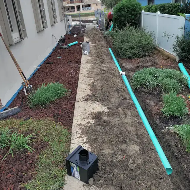 Underground drainage and downspout work — project 2