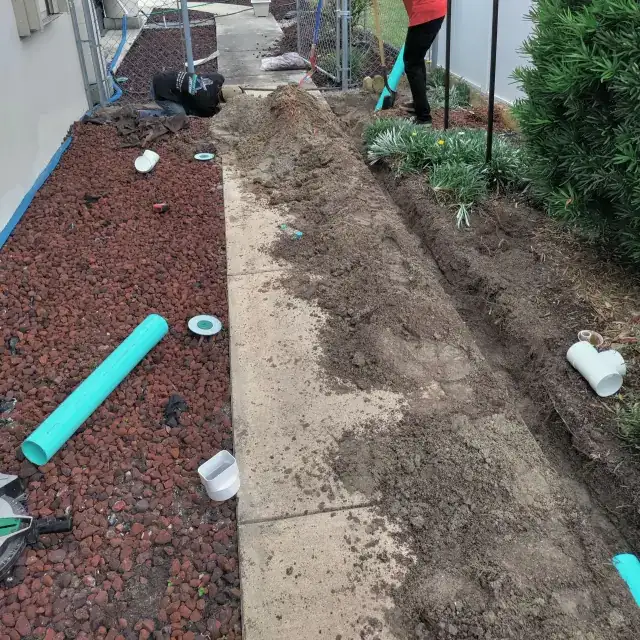 Underground drainage and downspout work — project 3