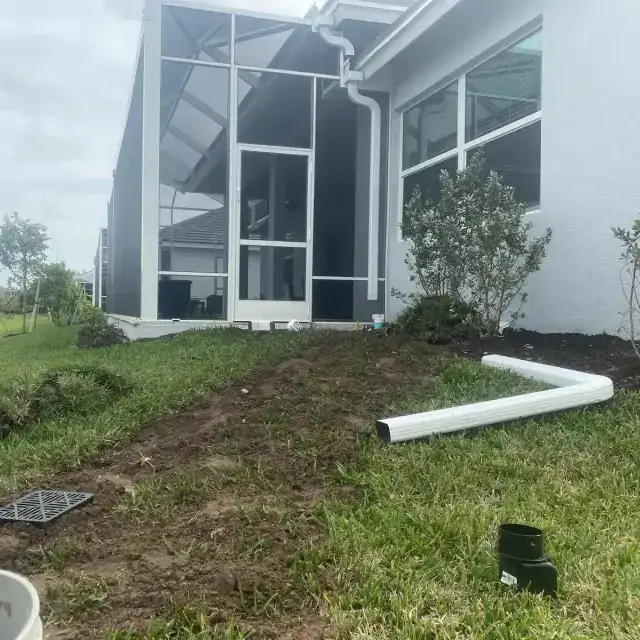 Underground drainage and downspout work — project 7