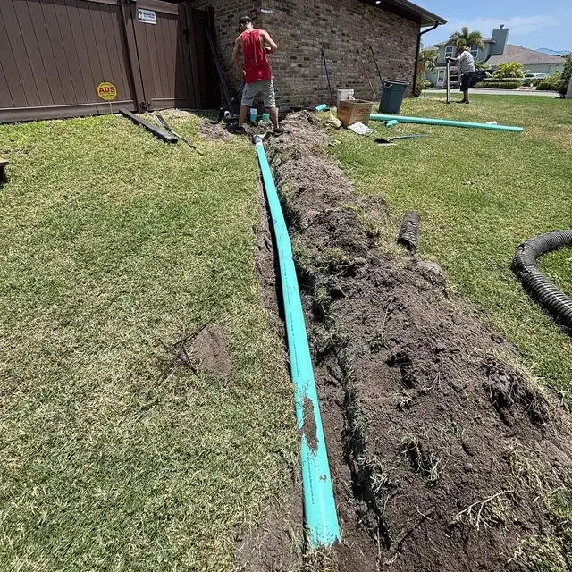 Underground drainage and downspout work — project 12